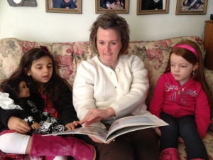 Story time with my attentive great nieces, A'Marie and Channing. 